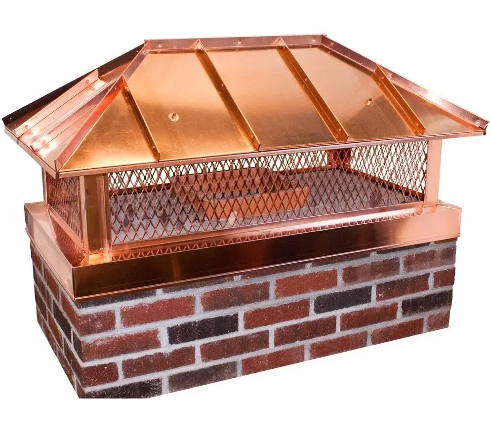 Copper custom outside mount chimney cap with hip ridge and standing seams