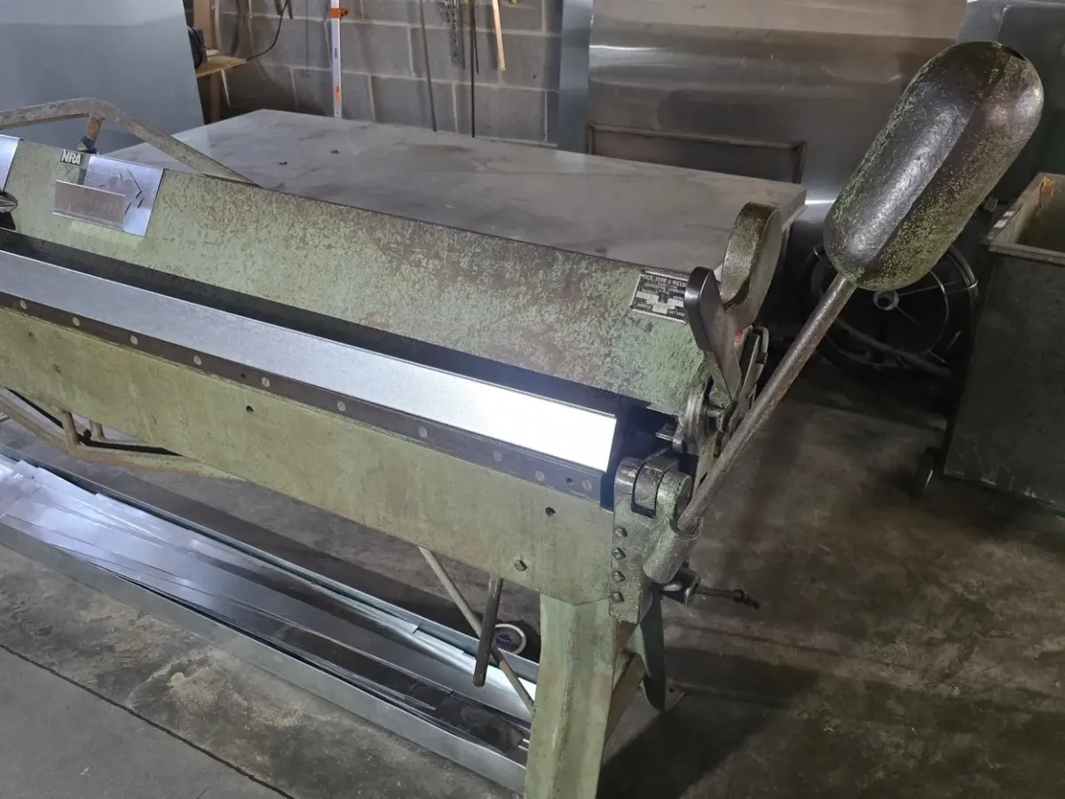 Sheet metal brake used for custom chase cover fabrication