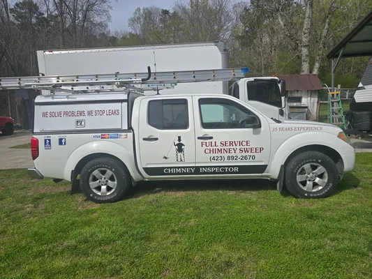 Full Service Chimney Sweep Nissan Frontier service truck