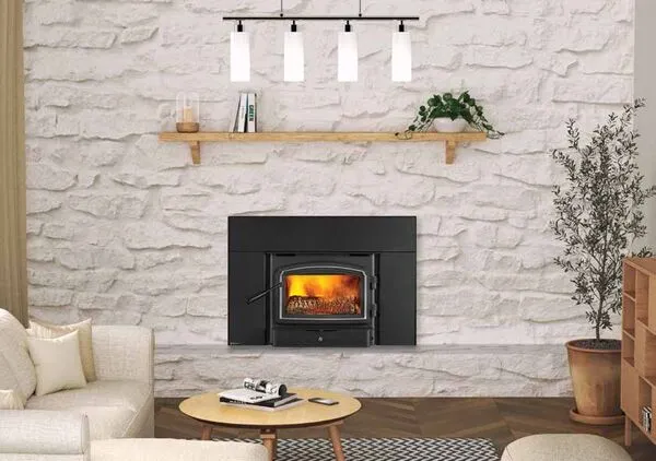 Regency Classic i1150 small wood insert in white stone fireplace